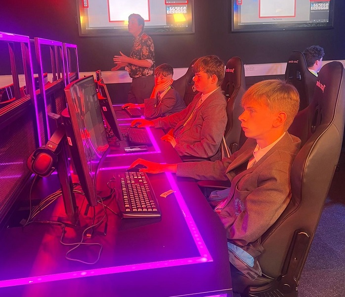 Students from local schools working in the Esports arena